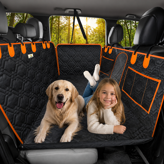 Waterproof dog car seat cover with hard bottom backseat hammock, featuring a golden retriever and child comfortably riding in a protected car interior with door protectors and storage pockets